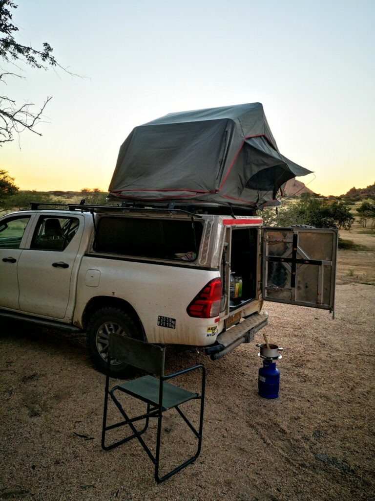 Preparing my dinner during the sundowner - Camping at Spitzkoppe